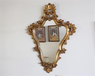 Large gold gilt shield shaped mirror