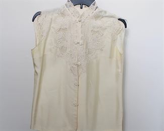 Silk and lace blouse, size medium.  We have racks of great, like new women's clothes size small to medium, vintage to current trend!
