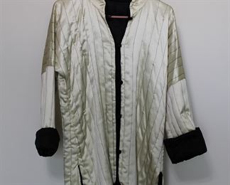 Fabulous quilted jacket with a Neru collar.  We have racks of great, like new women's clothes size small to medium, vintage to current trend!