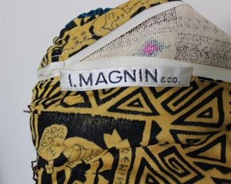 Label on the 1970's I Magnin velvet and linen Boho Chic maxi skirt, size medium.  We have racks of great, like new women's clothes size small to medium, vintage to current trend!