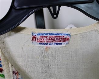 Label on vintage Made in India 100% cotton embroidered blouse, size Medium/Large.  We have racks of great, like new women's clothes size small to medium, vintage to current trend!