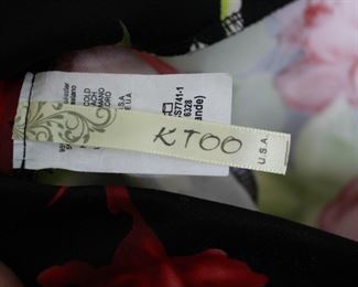 Label on K TOO floral print skirt, size Large.  We have racks of great, like new women's clothes size small to medium, vintage to current trend!