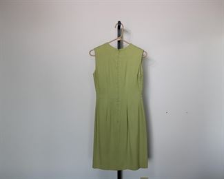 Back of the super vintage 1960's Alice Edwards, Made in England dress, size 12.  We have racks of great, like new women's clothes size small to medium, vintage to current trend!