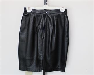Black leather skirt size small/medium.  We have racks of great, like new women's clothes size small to medium, vintage to current trend!
