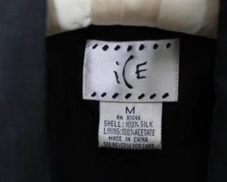 Label on ice black silk vest, size medium.  We have racks of great, like new women's clothes size small to medium, vintage to current trend!