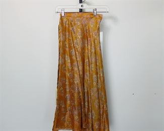 1970's silk wrap reversible maxi skirt.  We have racks of great, like new women's clothes size small to medium, vintage to current trend!