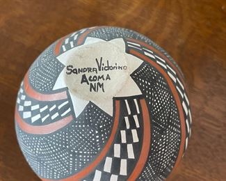 Native American Acoma Pottery including a vase by Sandra Victorino, a seed pot by Marilyn Ray, and a carved vase by an unidentified potter