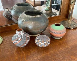 Native American Acoma Pottery including a vase by Sandra Victorino, a seed pot by Marilyn Ray, and a carved vase by an unidentified potter