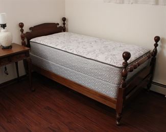 Lovely pair of cherry wood twin beds with clean Sealy mattresses and box springs