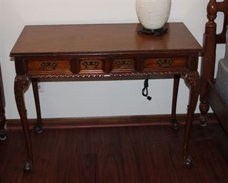 Mahogany table or desk with claw and ball feet