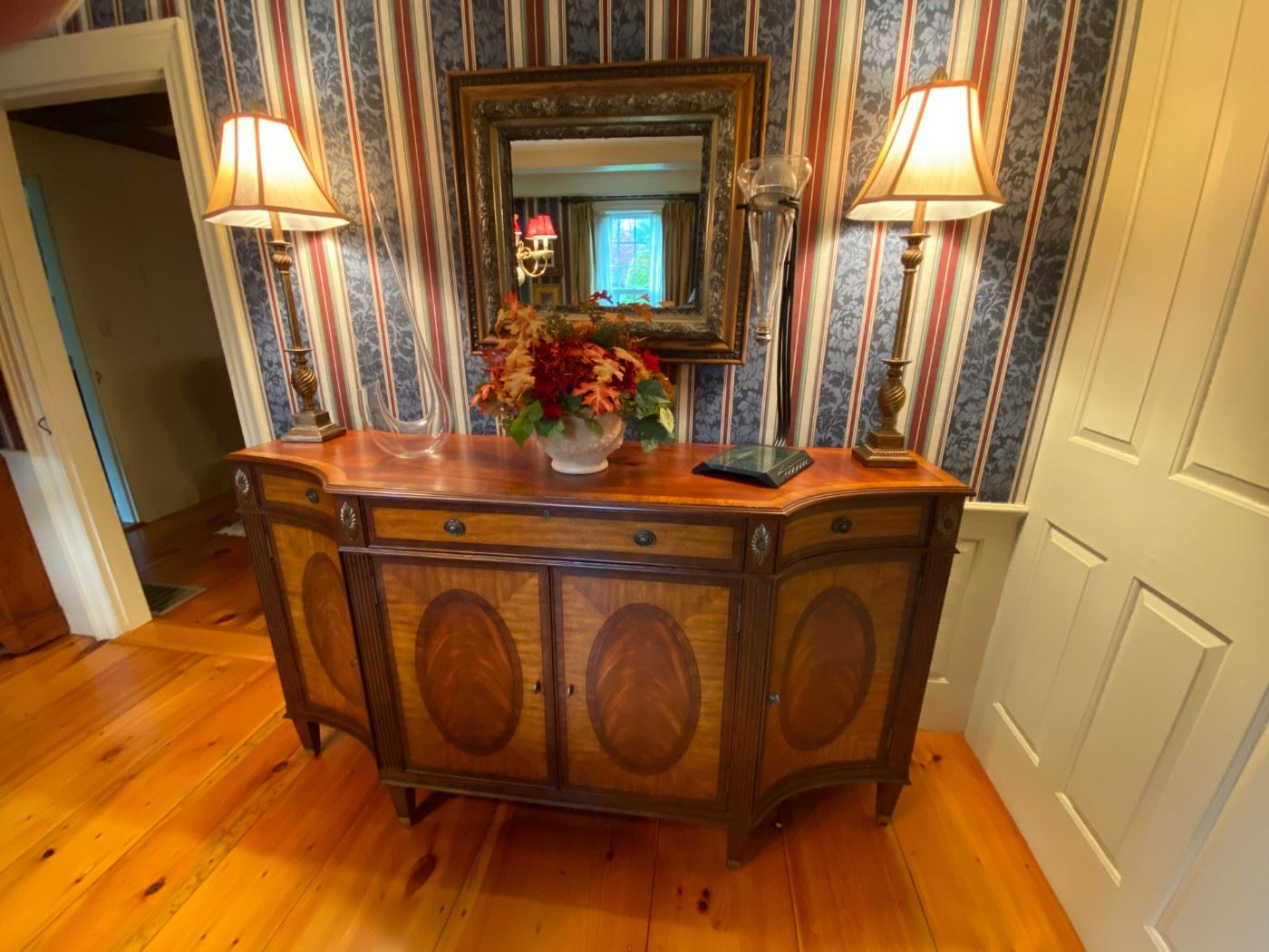Beautiful inlaid sideboard is 70" long by 20" deep and 39" tall.