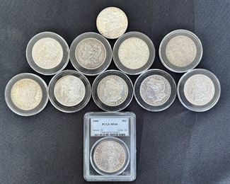 11 Fine- Uncirculated Silver Dollars & One Half -Dollar Coin