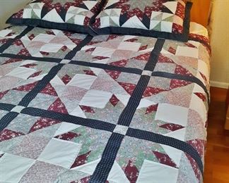 Queen bed with pine headboard