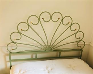 One of a pair of green metal twin size headboards (47” high at center) 