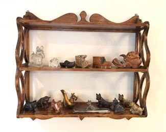 Scottie dog figurines (metal & glass), carved wood boots - on old wooden shelf