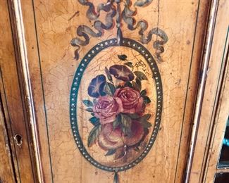 Hand painted decoration on china cabinet 