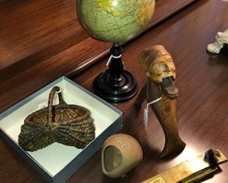 Miniature buttocks basket, Philips 6 inch Terrestrial Globe (London, c. 1930s), carved figural nutcracker, Robert Maxwell pottery beastie/critter , brass piano pedals