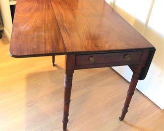 Pembroke table with one leaf up 