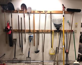 Yard tools: shovels, pitchforks, rakes, pole trimmer, shovels, hedge trimmer