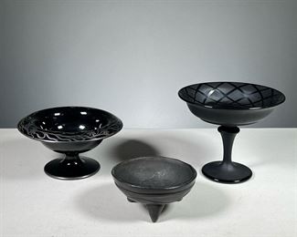 (3PC) ASSORTED BLACK BOWLS  |  Various black glass and ceramic bowls, including two compotes and a molcajete. Dimensions: h. 6.5 x dia. 6.5 in