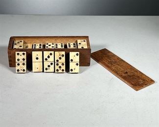 ANTIQUE BONE DOMINOES  |  Carved bone domino set in original wooden box. 