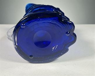 BLUE BLOWN GLASS TOBY |  An unusual blue blown glass Toby jug with clear glass applied handle.