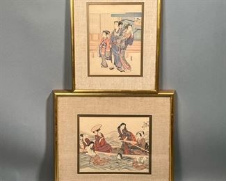 (2PC) TRADITIONAL JAPANESE PRINTS  |  Japanese woodblock prints, including one showing a man, woman, and child in front of a house in traditional clothing; and a scene with four women in a river floating by two bathing men; both similarly matted in gilt frames. 