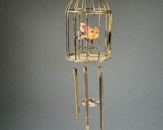 CANARY WIND CHIME  |  Brass wind chime featuring red and yellow canary in a cage with functioning cage door- chimes beautifully. 
