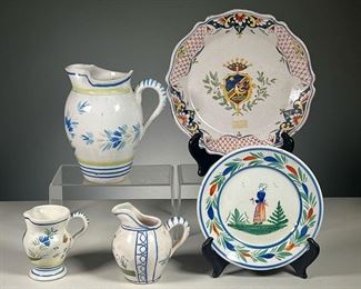 (5PC) FRENCH QUIMPER  |  Faience pottery, including a pitcher (h. 7.5 in.), two small creamers, and a small round plate, each signed Quimper; plus a shaped plate with central crest with rooster (dia. 9.75 in.)