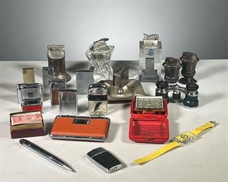 (21PC) LIGHTERS, CLOCKS, ETC.  |  Includes: antique box of Cupid Safety Matches, Large collection of table lighters, handheld lighters, a pen lighter, ash tray, small and foldable binoculars, a small watch and folding Zetka travel clock in a red leather case. 