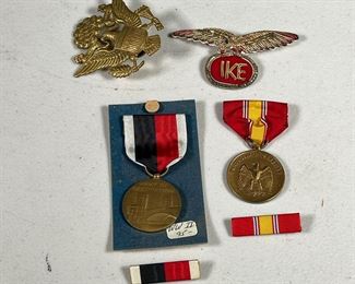 (6PC) WWII MEDALS, RIBBONS, & PINS  |  Includes: National Defense Medal & corresponding ribbon, Army of Occupation Medal & corresponding ribbon from 1945, Bald Eagle Pin clutching arrows and an olive branch with E. Pluribus Unum, and a cloth Iike pin.