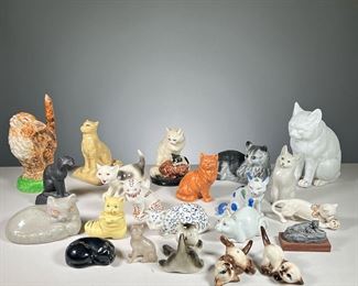 (22PC) COLLECTION OF CATS  |  Large collection of cats including porcelain cats, hand painted ceramics, carved stone, plaster and others. 