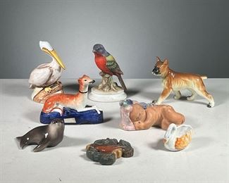 (8PC) ASSORTED CERAMIC ANIMALS | Includes: Violet Lichten Ware sleeping baby, hand painted bumting bird, pelican, Alaskan seal, a dog, swan, and more.