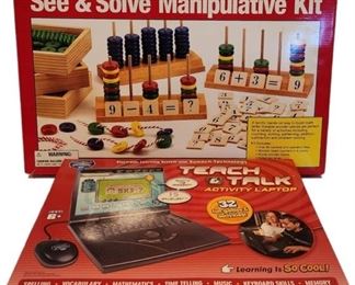 Childrens Teaching Game and Laptop