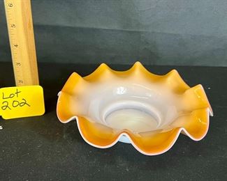 orange cased brides basket bowl 
