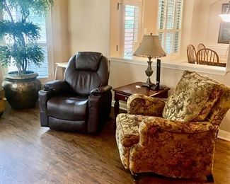 2 recliners 1 on left is a lift up chair with massage and heat less then 1 yr old