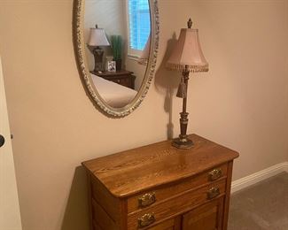 Antique 2 drawer/cabinet wash stand or dresser. Large oval wall mirror