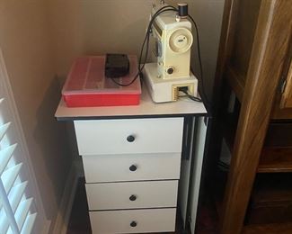 Sewing machine & 4 drawer sewing table sold separately