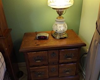 Nightstand and vintage parlor lamp