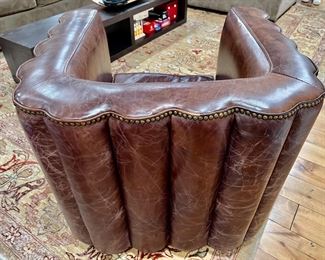 33. Scalloped Brown Leather Barrel Chair w/ Nailhead Detail (32" x 30" x 27")