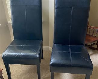 pair of black leather parson's chairs 