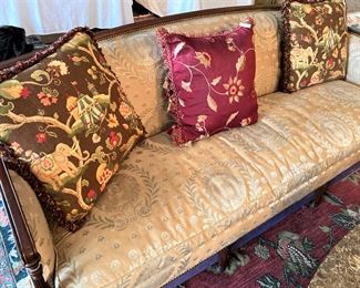 Antique sofa with decorative pillows