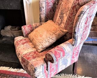 One of two matching wingback chairs