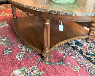 Marble top coffee table with lower tier