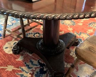 Round game table with center base