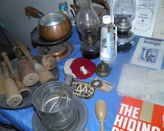 potato mashers, oil lanterns, copper fondue pot