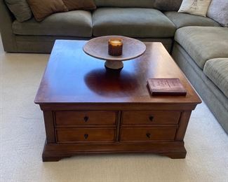 Square coffee table with storage