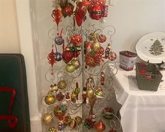 Metal tree with unique Christmas ornaments