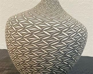 5	$375 	
"Victorino E 2011, Indian Art pottery Acoma vase. Graphic B/W"	marked and signed 