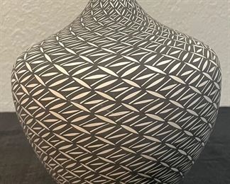 5	$375 	
"Victorino E 2011, Indian Art pottery Acoma vase. Graphic B/W"	marked and signed 